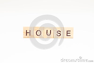 Word HOUSE made of wooden blocks on white background Stock Photo