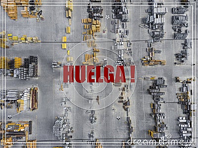 Word Huelga in spanish language. Industrial storage place, view Stock Photo