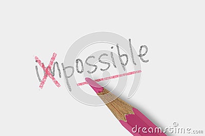 The word impossible corrected with pink pencil on white background - Concept of make the impossible possible Stock Photo