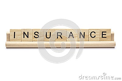 Word ``insurance`` on scrabble wooden letters on a rack, isolate Stock Photo