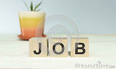 alphabet on wooden cubes. Background copy space, minimal. Job application process, creating safe job procedures and Stock Photo