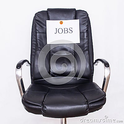 The word jobs on an office business chair. The concept of the workflow in the office, recruitment and vacancies Stock Photo