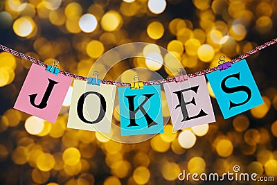 Word JOKES printed on clothespin clipped cards Stock Photo