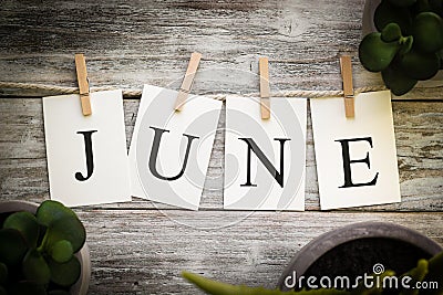 The Word JUNE Concept Printed on Cards Stock Photo