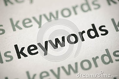 Word keywords printed on paper macro Stock Photo