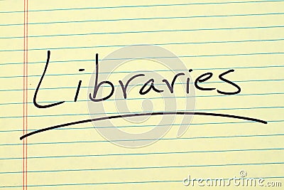 Libraries On A Yellow Legal Pad Stock Photo