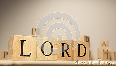 The word lord is from wooden cubes. Economy state government terms Stock Photo