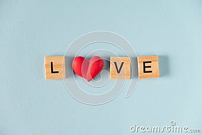 Word love and hearts on blue background. Valentine`s Day background. Valentines day, Mothers day, Womens day Stock Photo