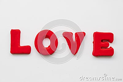 The word Love is made up of red letters on a white background Stock Photo