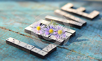 Word love of wooden dominoes Stock Photo