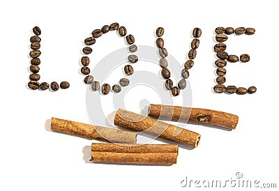 The word love writen with cinnamon stick and coffee beans on white background Stock Photo