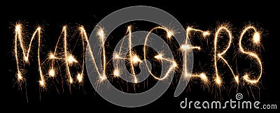 Word managers written sparkler Stock Photo