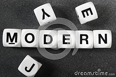 Word modern on toy cubes Stock Photo