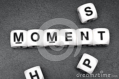 Word moment on toy cubes Stock Photo