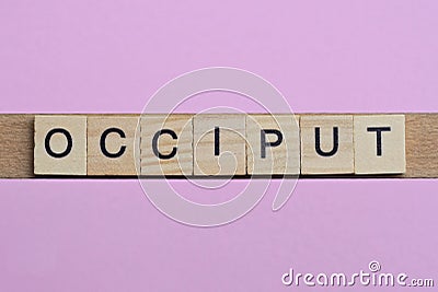 Word occiput from small gray wooden letters Stock Photo