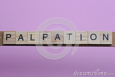 word palpation from small gray wooden letters Stock Photo