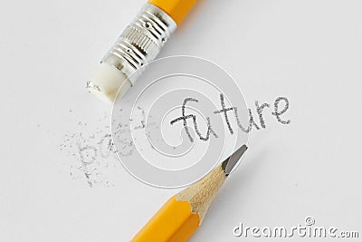 The word past erased with a rubber and the word future written with a pencil on white paper - Concept of time, clearing the past Stock Photo