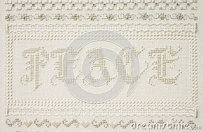 Word of Peace handcrafted embroidery needlework Stock Photo