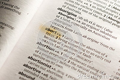 The word or phrase Abort in a dictionary Stock Photo