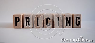 Word PRICING, inscription on wooden cubes on white background Stock Photo