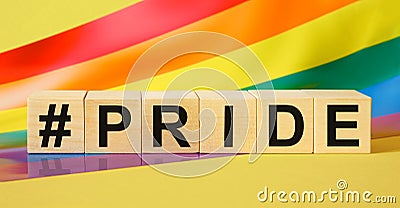 Word PRIDE made with wooden blocks Stock Photo