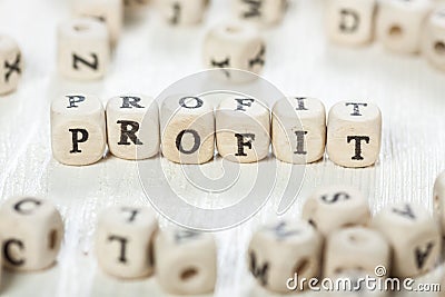 Profit word written on wood block. Stock Photo