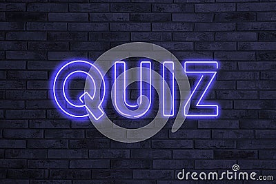 Word QUIZ made of neon letters on black brick background Stock Photo