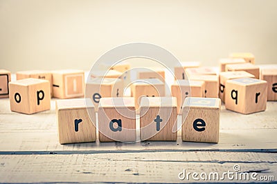 Word ` rate ` wood Cubic on the wood Stock Photo