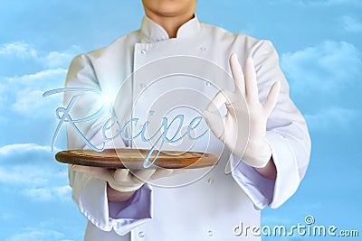 The word recipe in the hands of the chefs. Stock Photo
