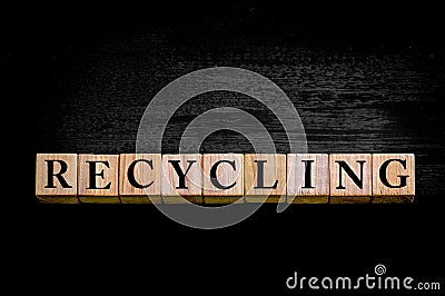 Word RECYCLING isolated on black background Stock Photo