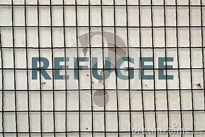 Word Refugee and fence Stock Photo