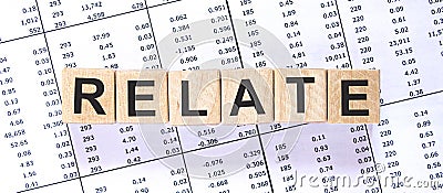 Word RELATE made with wood building blocks Stock Photo