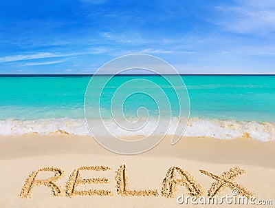 Word Relax on beach Stock Photo