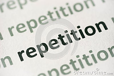 Word repetition printed on paper macro Stock Photo