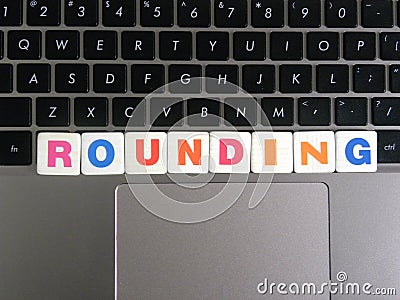 Word Rounding on keyboard background Stock Photo