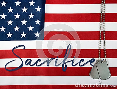 Word sacrifice with dog tags Stock Photo