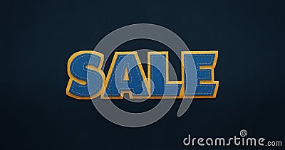 Sale. Blue word with yellow contour on dark blue background with felt texture. Stock Photo