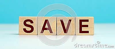 Word SAVE made with cube wooden block Stock Photo