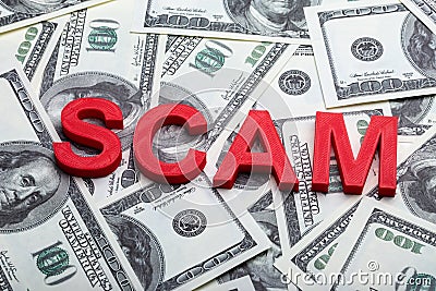 Word Scam On Hundred Dollar Bills Stock Photo