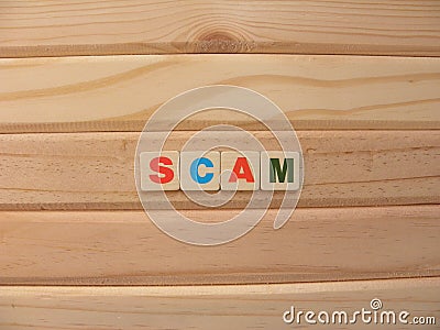 Word Scam on wood Stock Photo