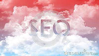Word SEO in the clouds, red sky colors Stock Photo