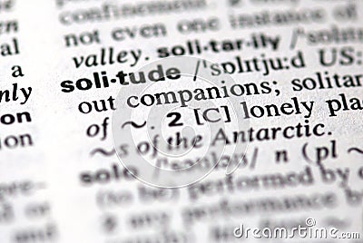 The word solitude in a dictionary Stock Photo