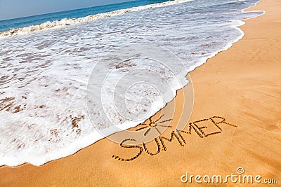 The Word Summer Written in the Sand on a Beach with Drawing of t Stock Photo