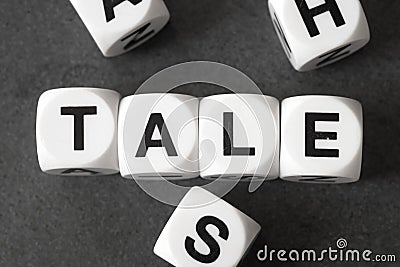 Word tale on toy cubes Stock Photo