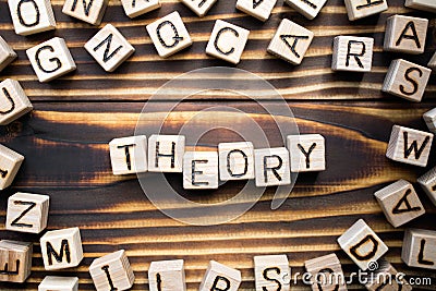 Word theory composed of wooden cubes Stock Photo