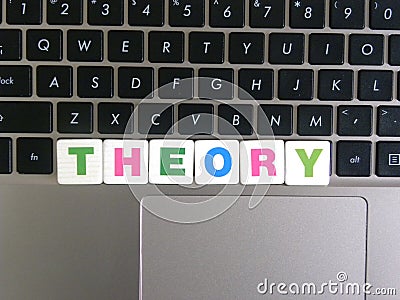 Word Theory on keyboard background Stock Photo