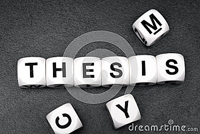 Word thesis on toy cubes Stock Photo