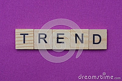 Word trend from small gray wooden letters Stock Photo