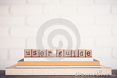 The word User guide and copy space background. Stock Photo