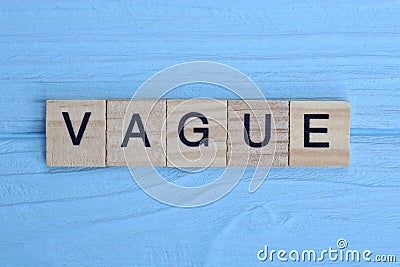 word vague made from wooden gray letters Stock Photo